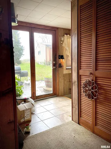 a view of livingroom with furniture and floor to ceiling window