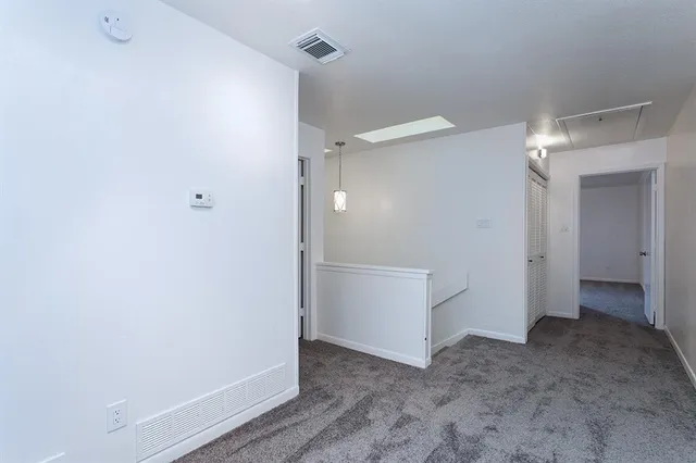 a view of storage and utility room with washer and dryer