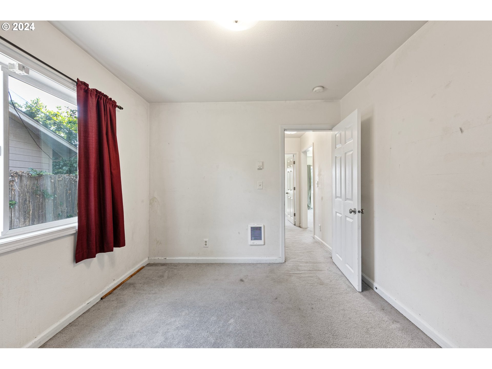179 35th Street Springfield, OR 97478 - Photo 20 of 46 a view of an empty room with a window
