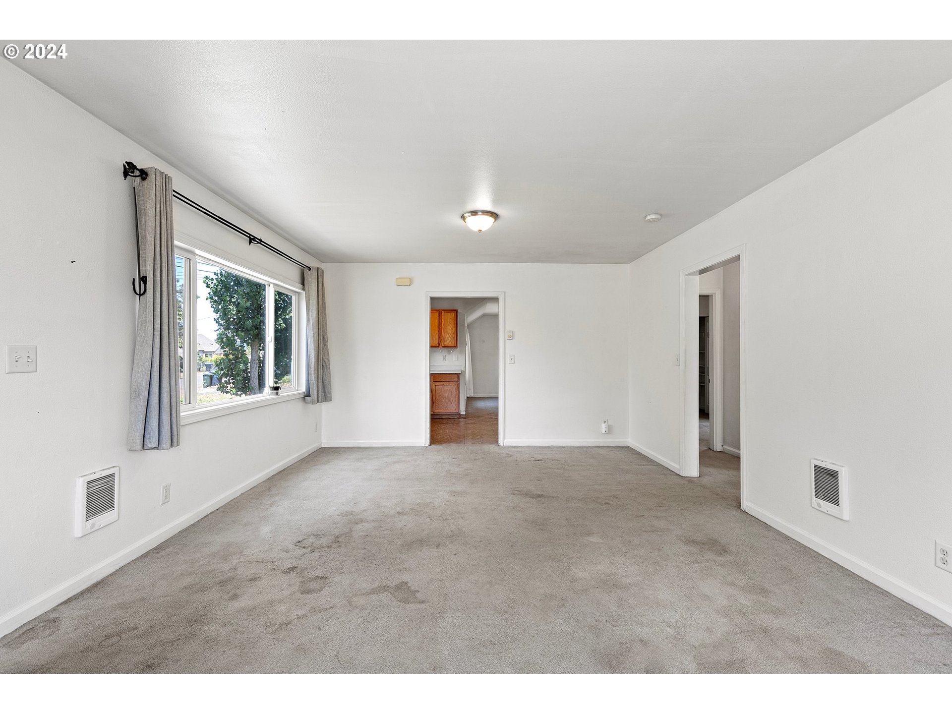 179 35th Street Springfield, OR 97478 - Photo 28 of 46 a view of an empty room with a window
