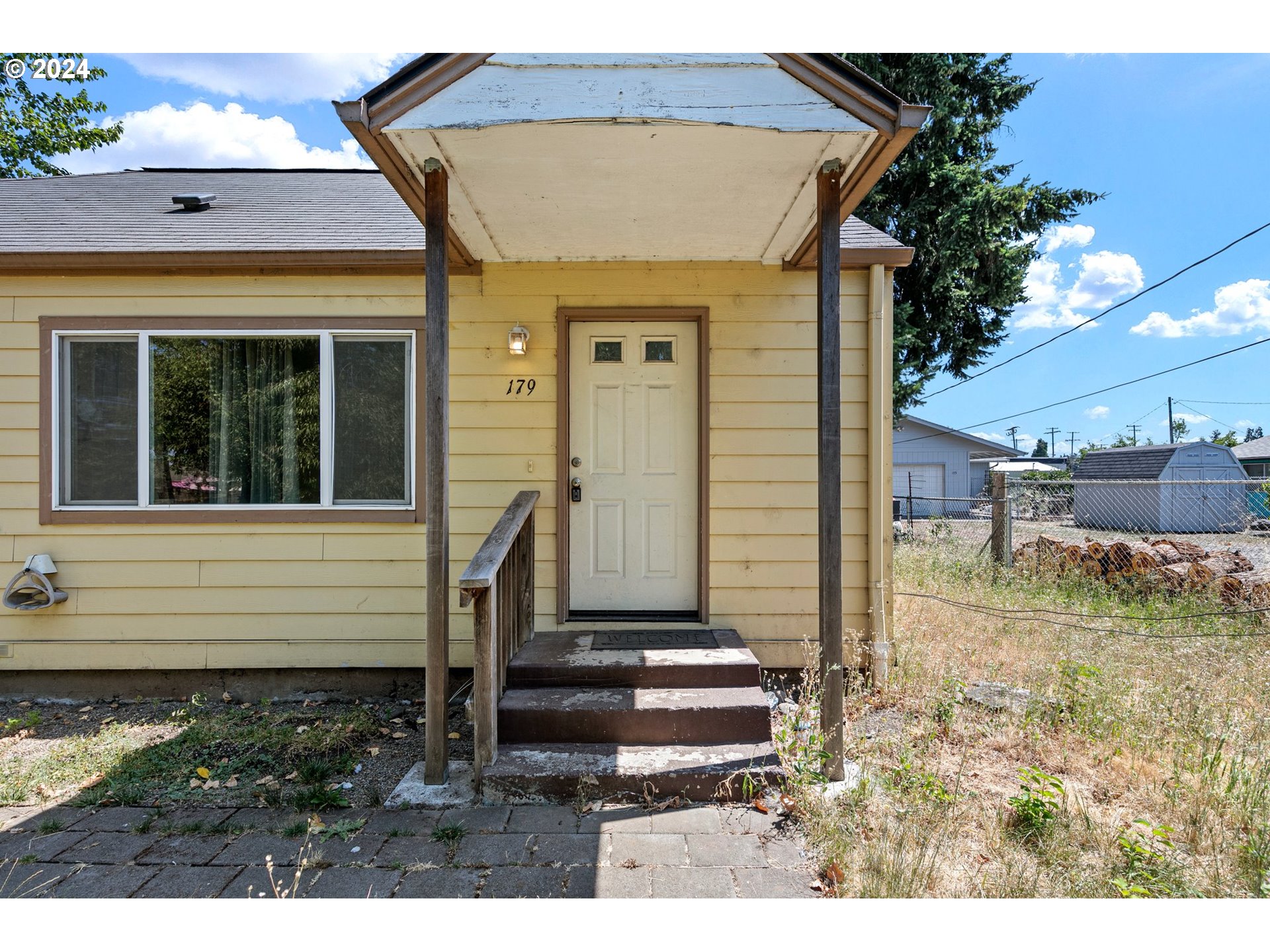 179 35th Street Springfield, OR 97478 - Photo 3 of 46 a view of a house with a small porch