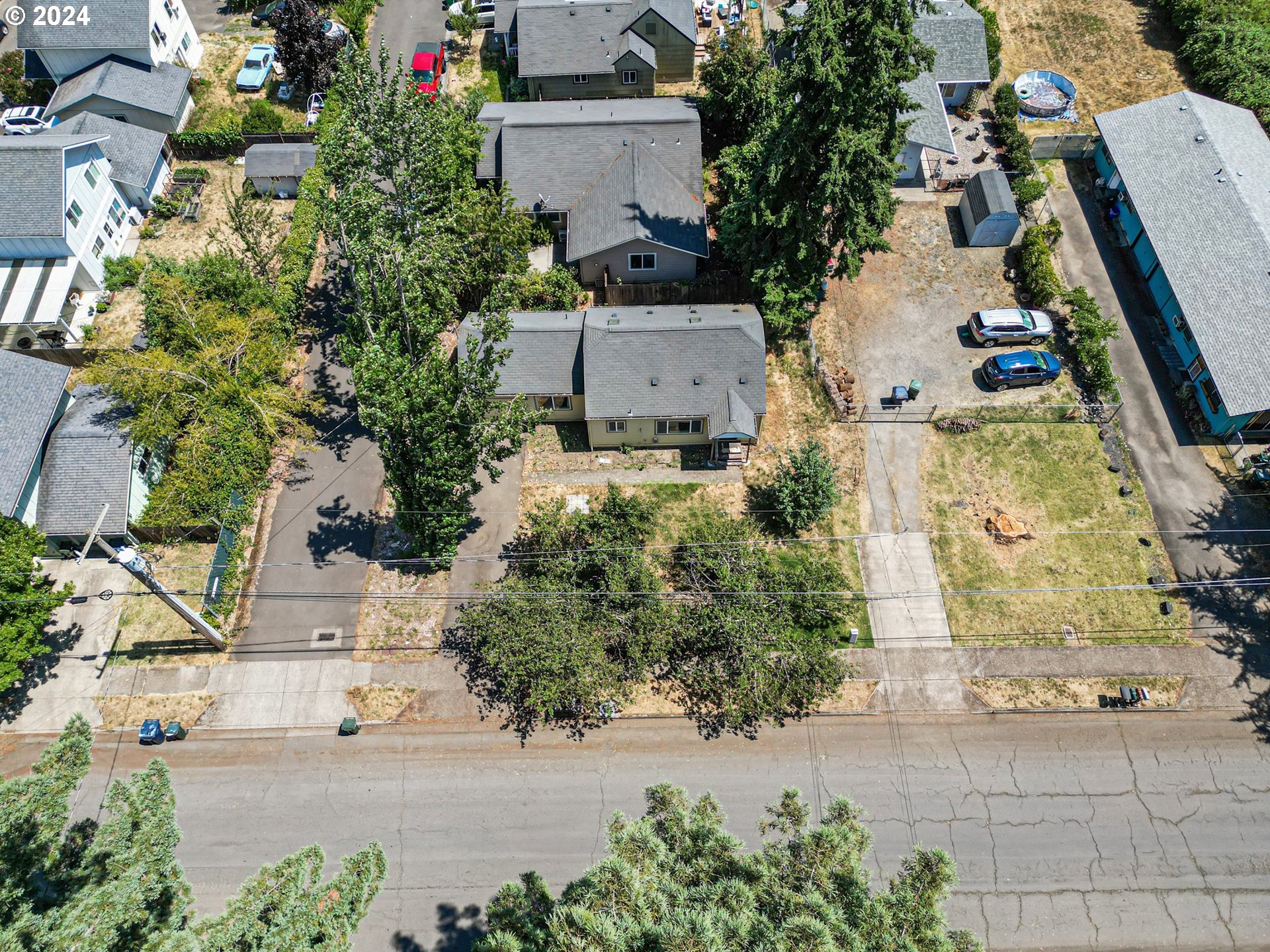 179 35th Street Springfield, OR 97478 - Photo 35 of 46 an aerial view of a house with a yard and garden