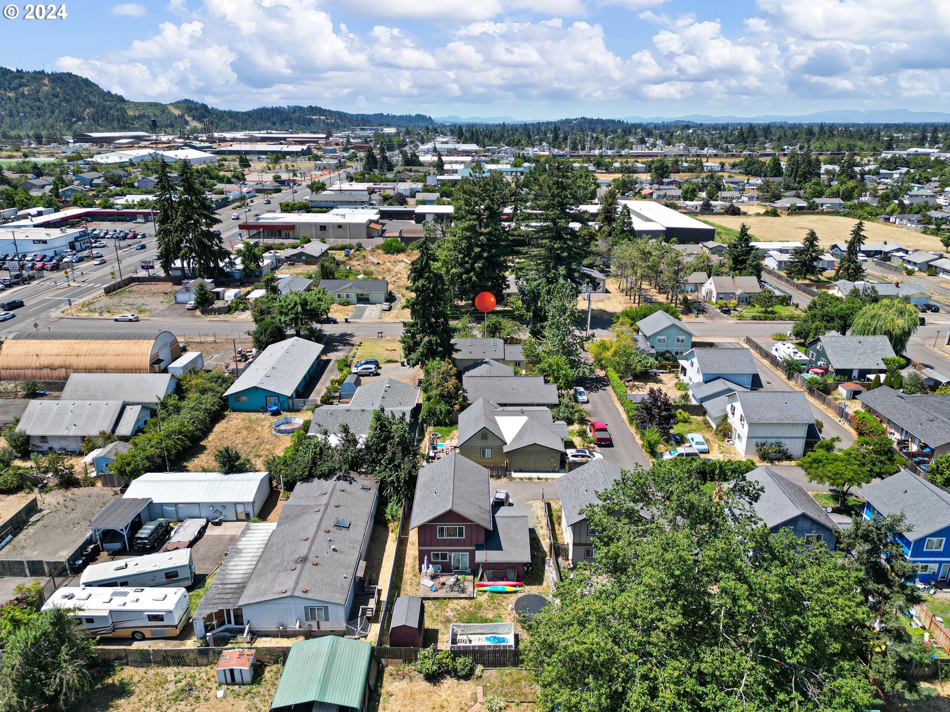 179 35th Street Springfield, OR 97478 - Photo 44 of 46 an aerial view of residential houses with outdoor space