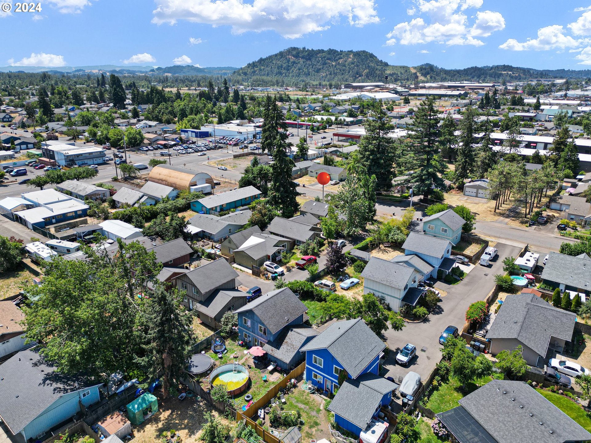 179 35th Street Springfield, OR 97478 - Photo 45 of 46 an aerial view of residential houses with outdoor space
