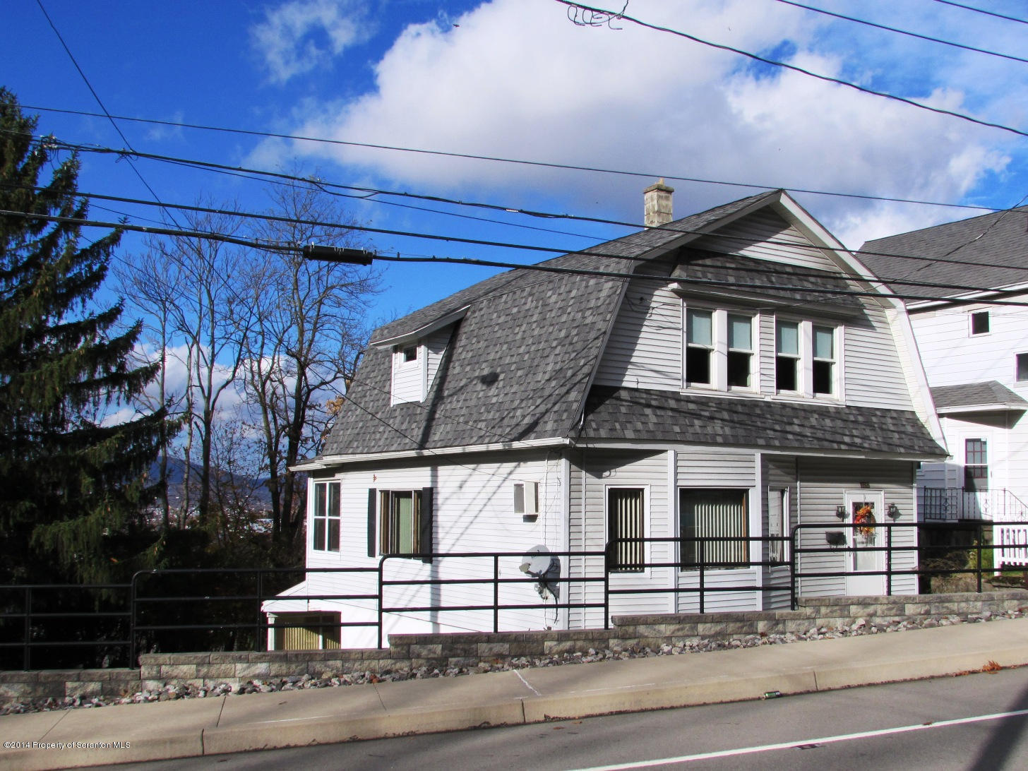 120 East Mountain Road Scranton, PA 18505 - Photo 1 of 14 a front view of a house with a road