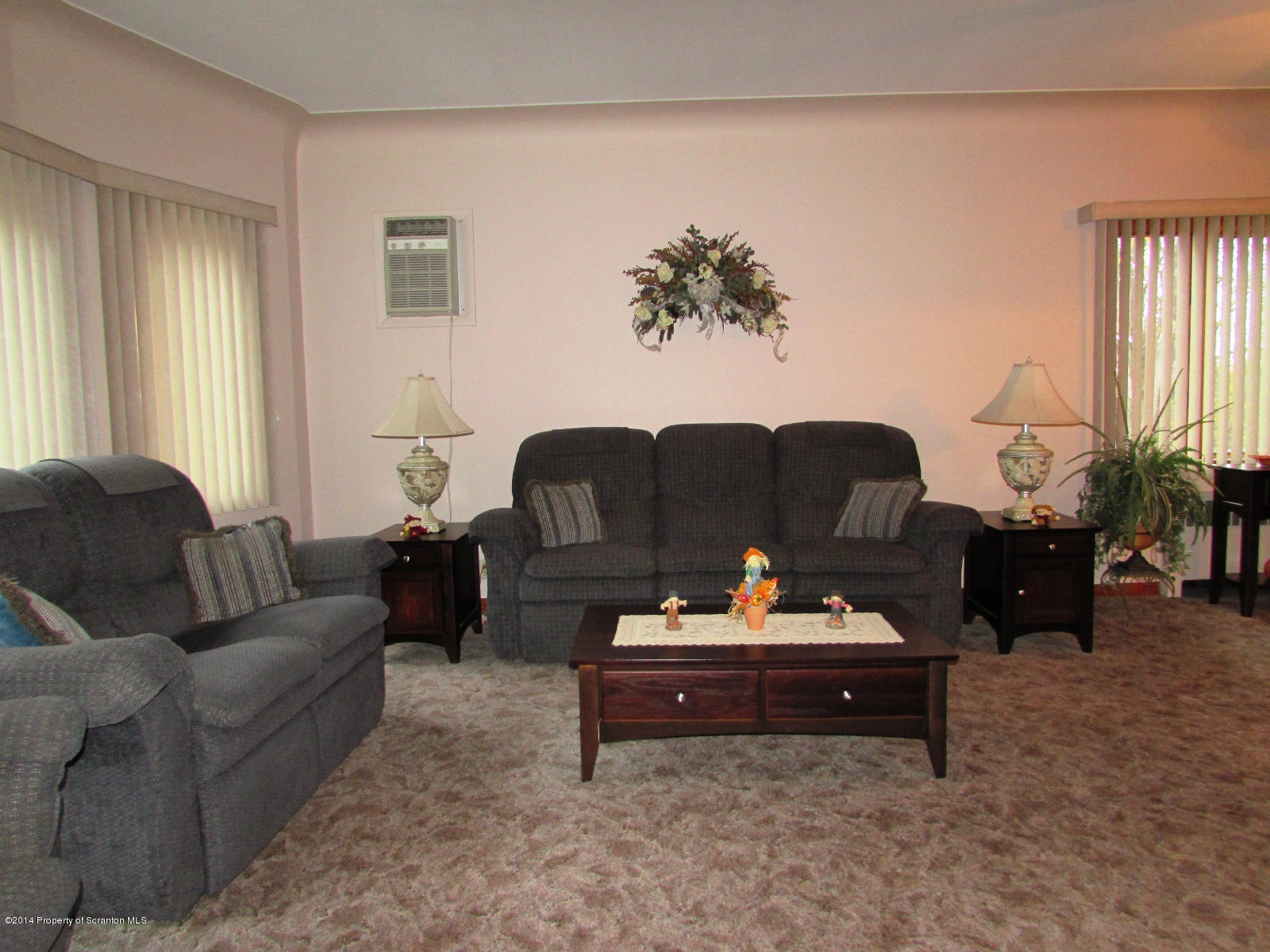 120 East Mountain Road Scranton, PA 18505 - Photo 4 of 14 a living room with furniture and a potted plant