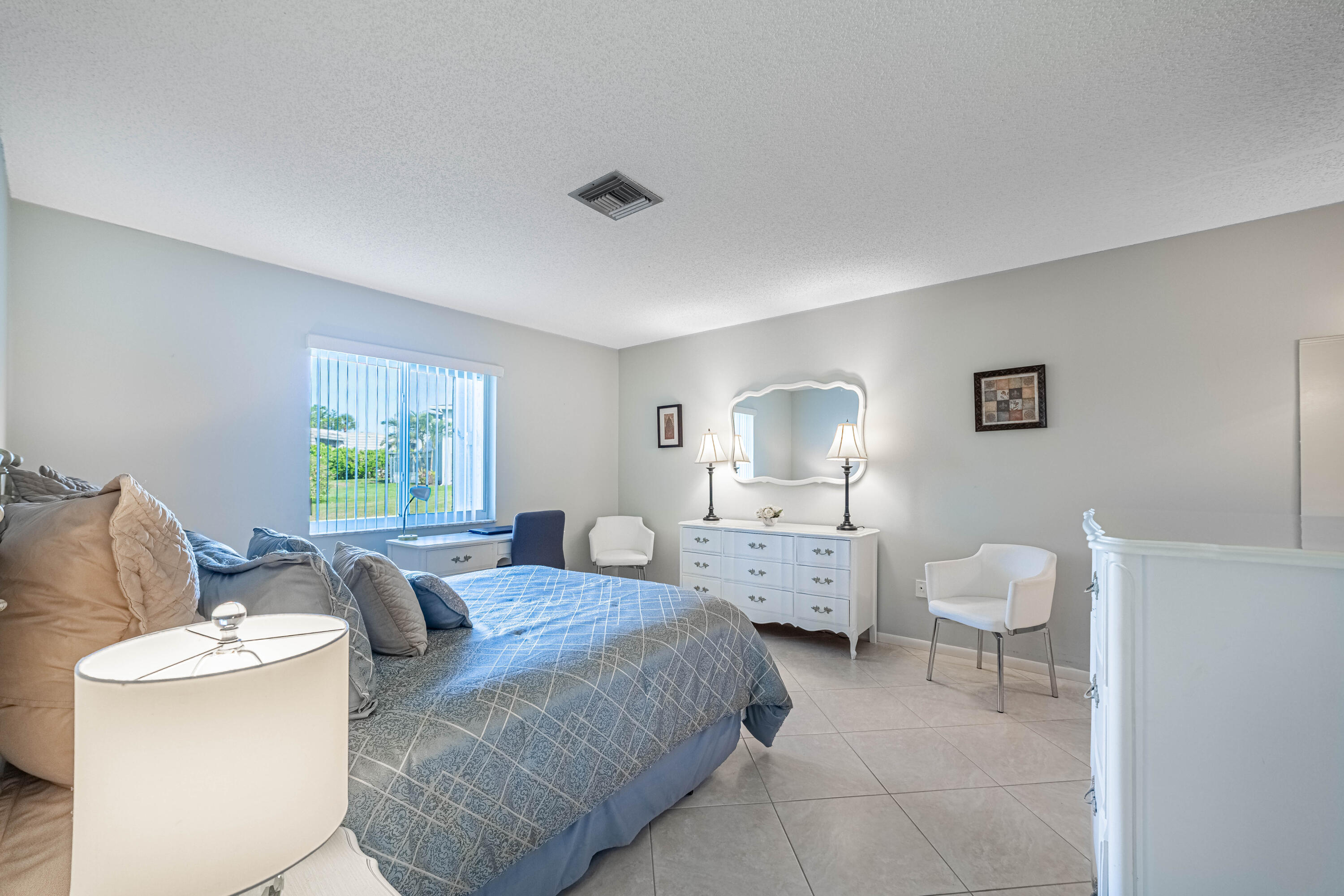 2711 Southwest 13th Street, Unit 39B Delray Beach, FL 33445 - Photo 12 of 55 Primary Bedroom