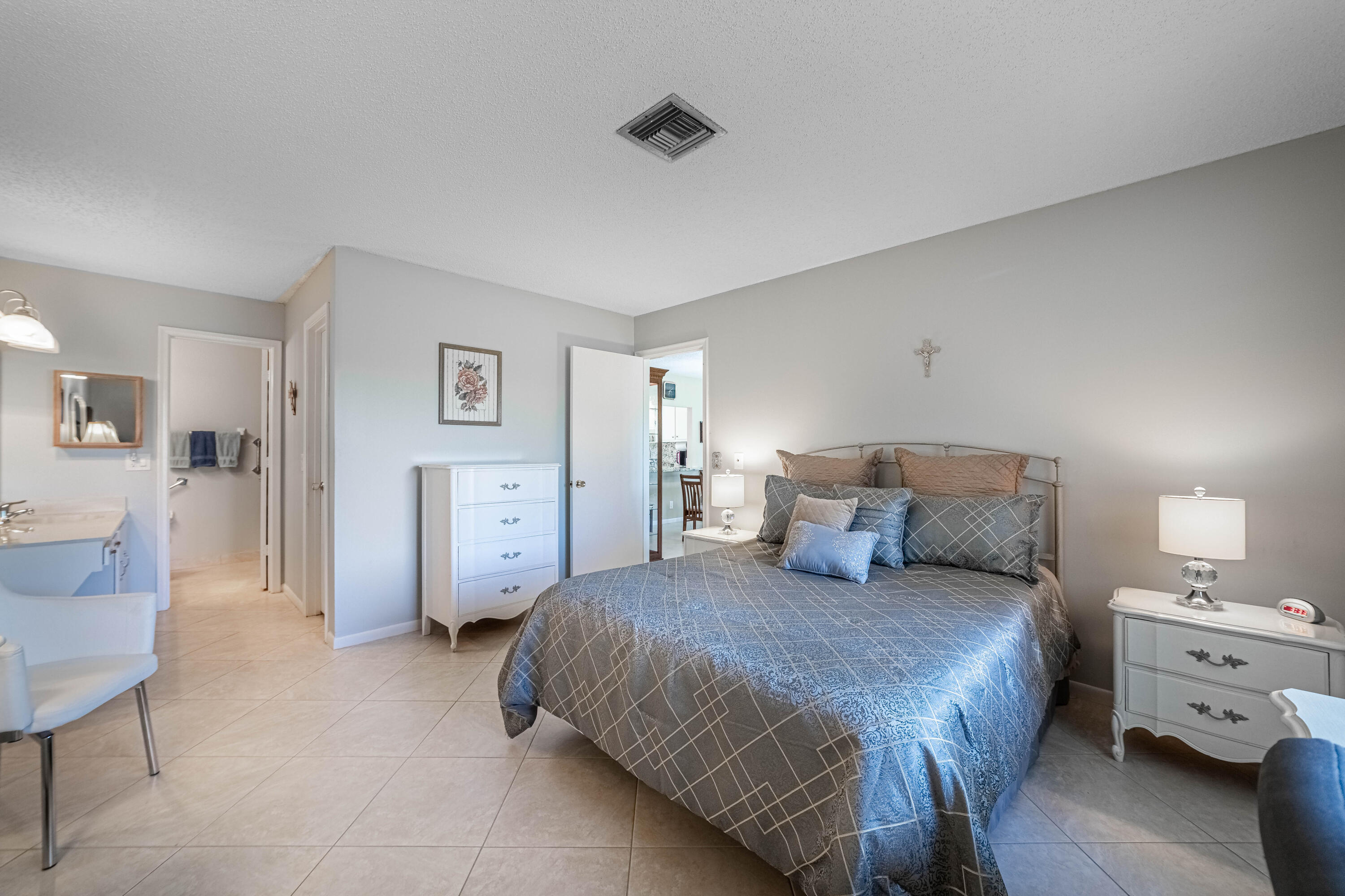 2711 Southwest 13th Street, Unit 39B Delray Beach, FL 33445 - Photo 13 of 55 Primary Bedroom