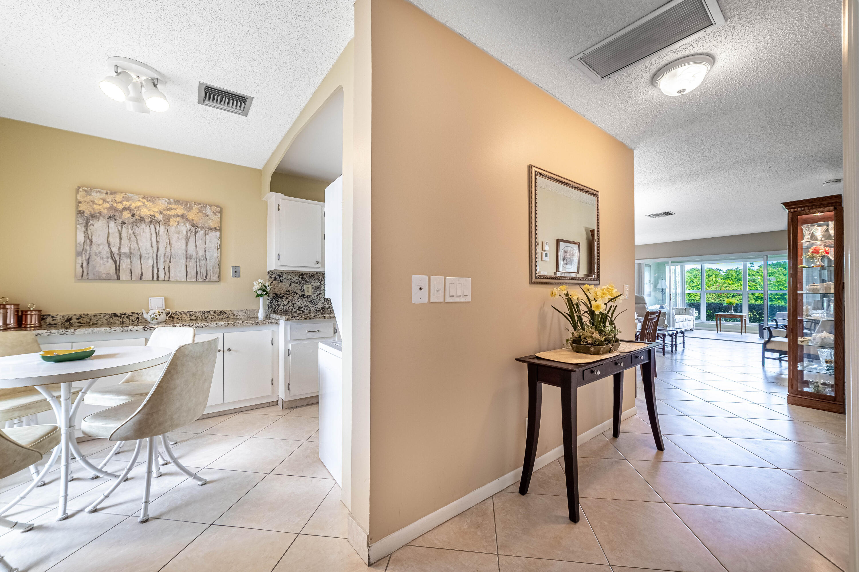 2711 Southwest 13th Street, Unit 39B Delray Beach, FL 33445 - Photo 6 of 55 Kitchen & Living Area