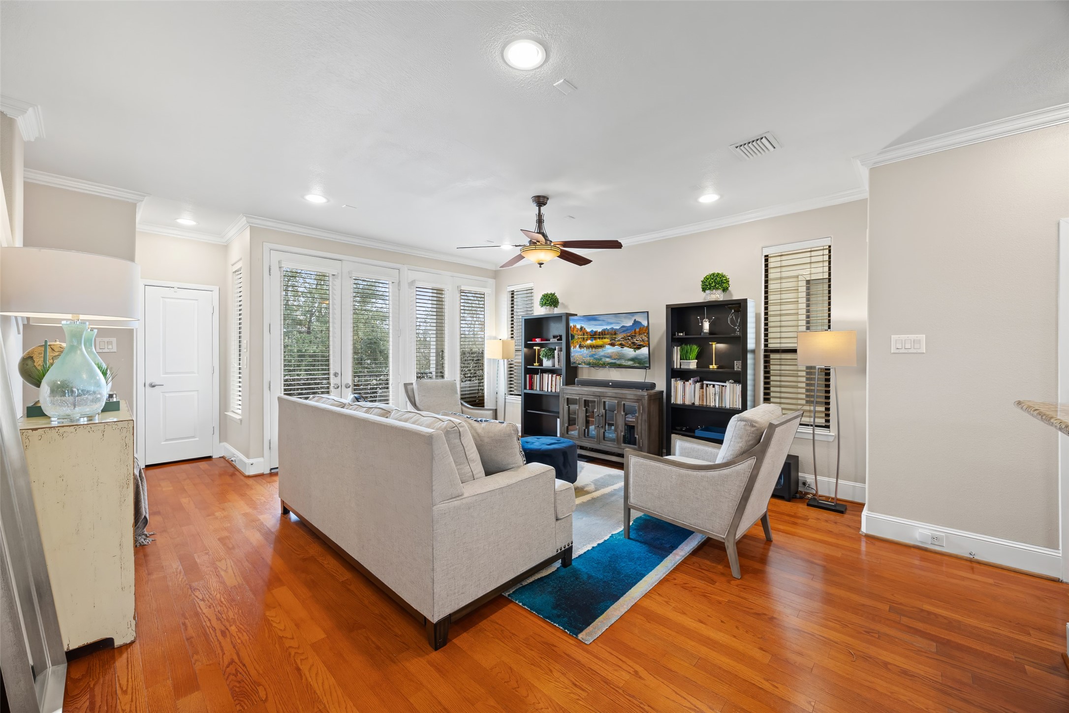 2320 Emancipation Avenue Houston, TX 77004 - Photo 12 of 38 a living room with fireplace furniture and a wooden floor