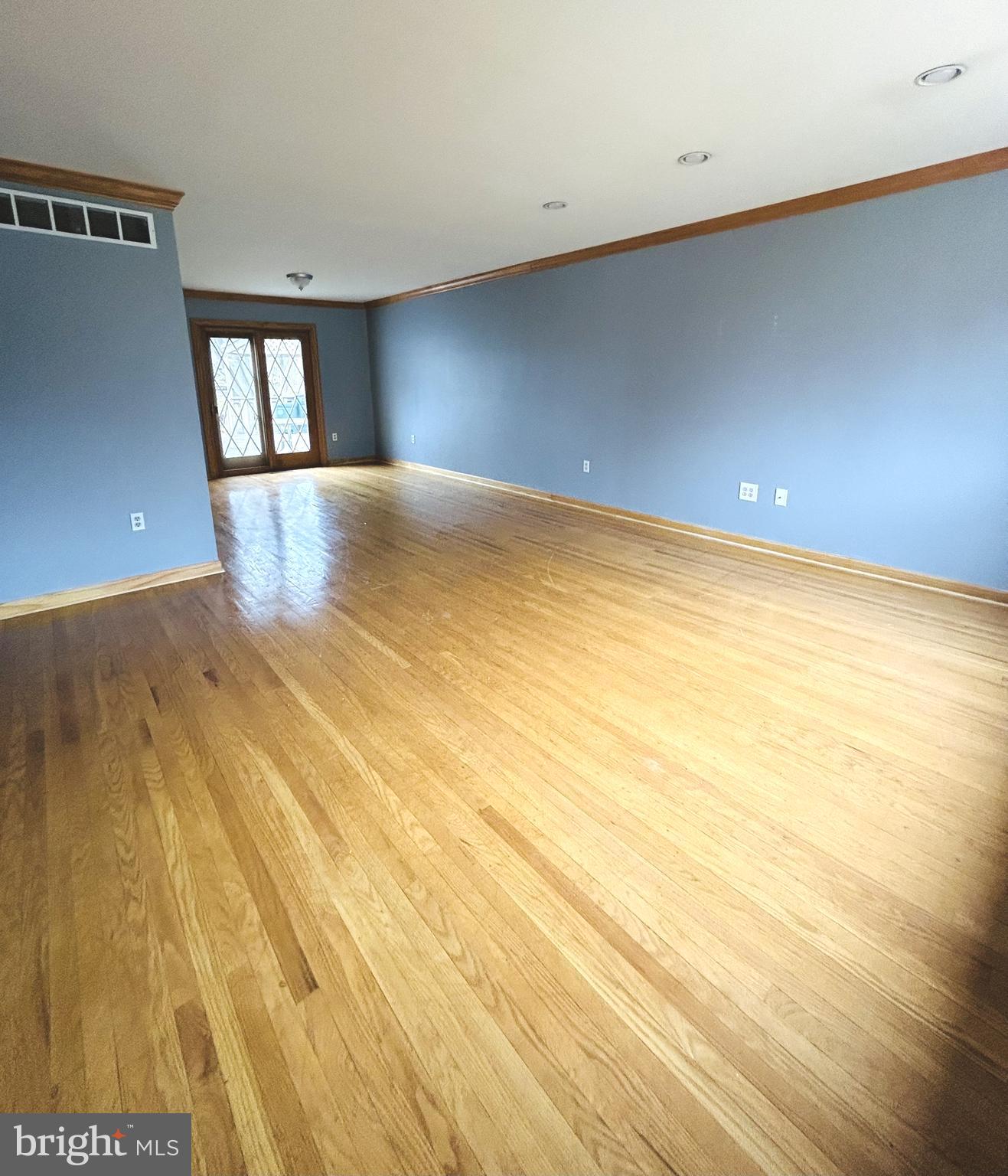 88 West Rambler Drive Southampton, PA 18966 - Photo 8 of 17 an empty room with wooden floor and windows