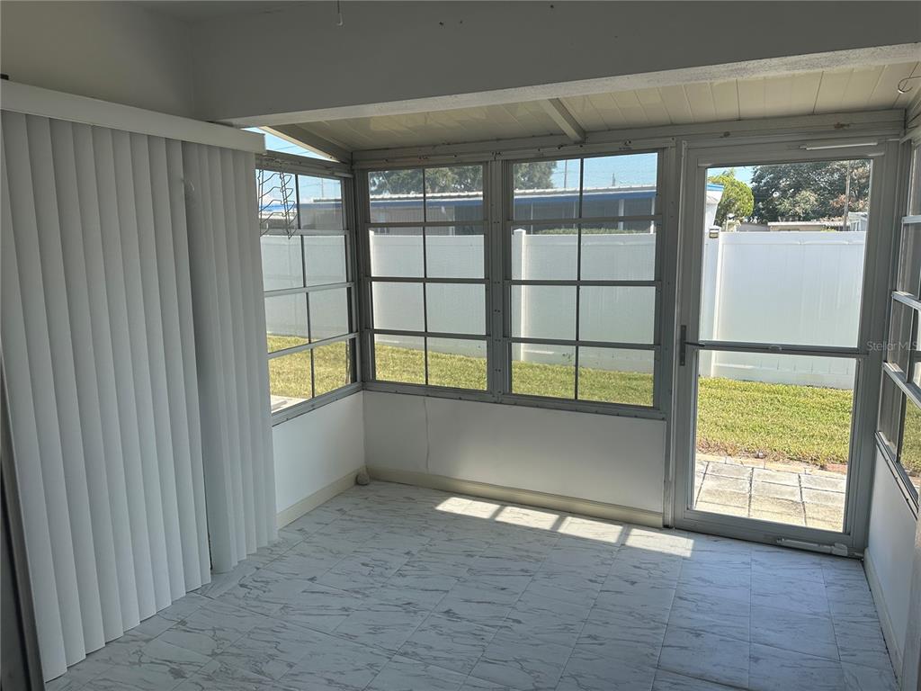 2250 Druid Road, Unit 403 Clearwater, FL 33764 - Photo 15 of 17 a view of an empty room with a window