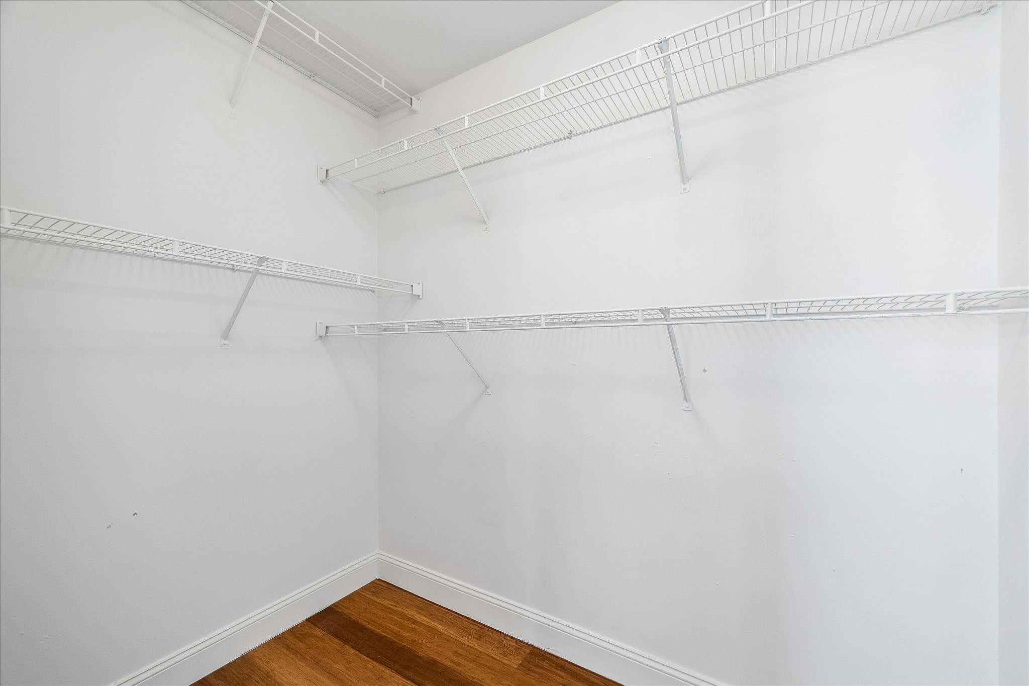 939 Colorado Street, Unit 22 Houston, TX 77007 - Photo 14 of 23 a view of a room with racks on the wall