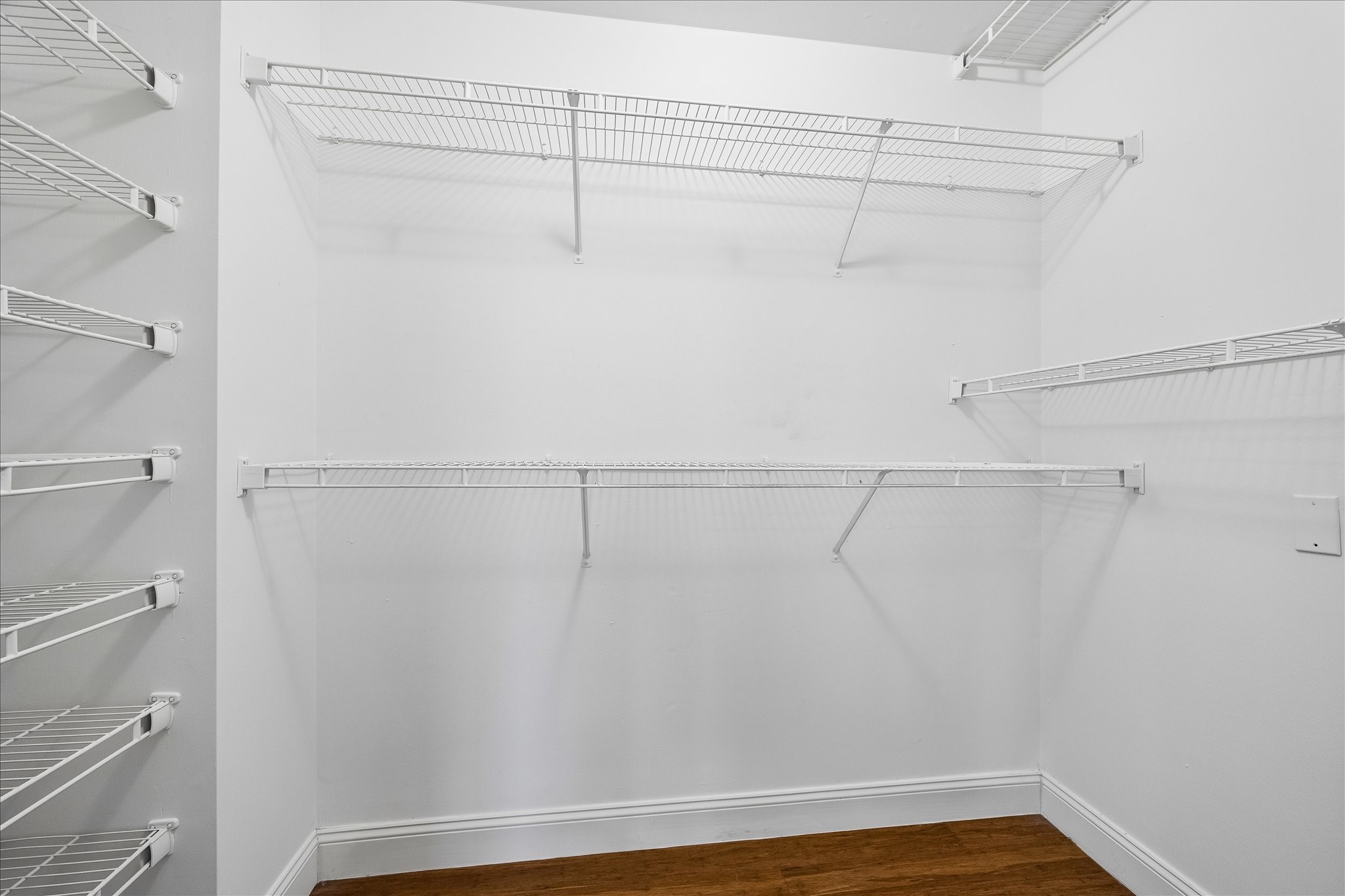 939 Colorado Street, Unit 22 Houston, TX 77007 - Photo 15 of 23 a view of a room with racks on the wall