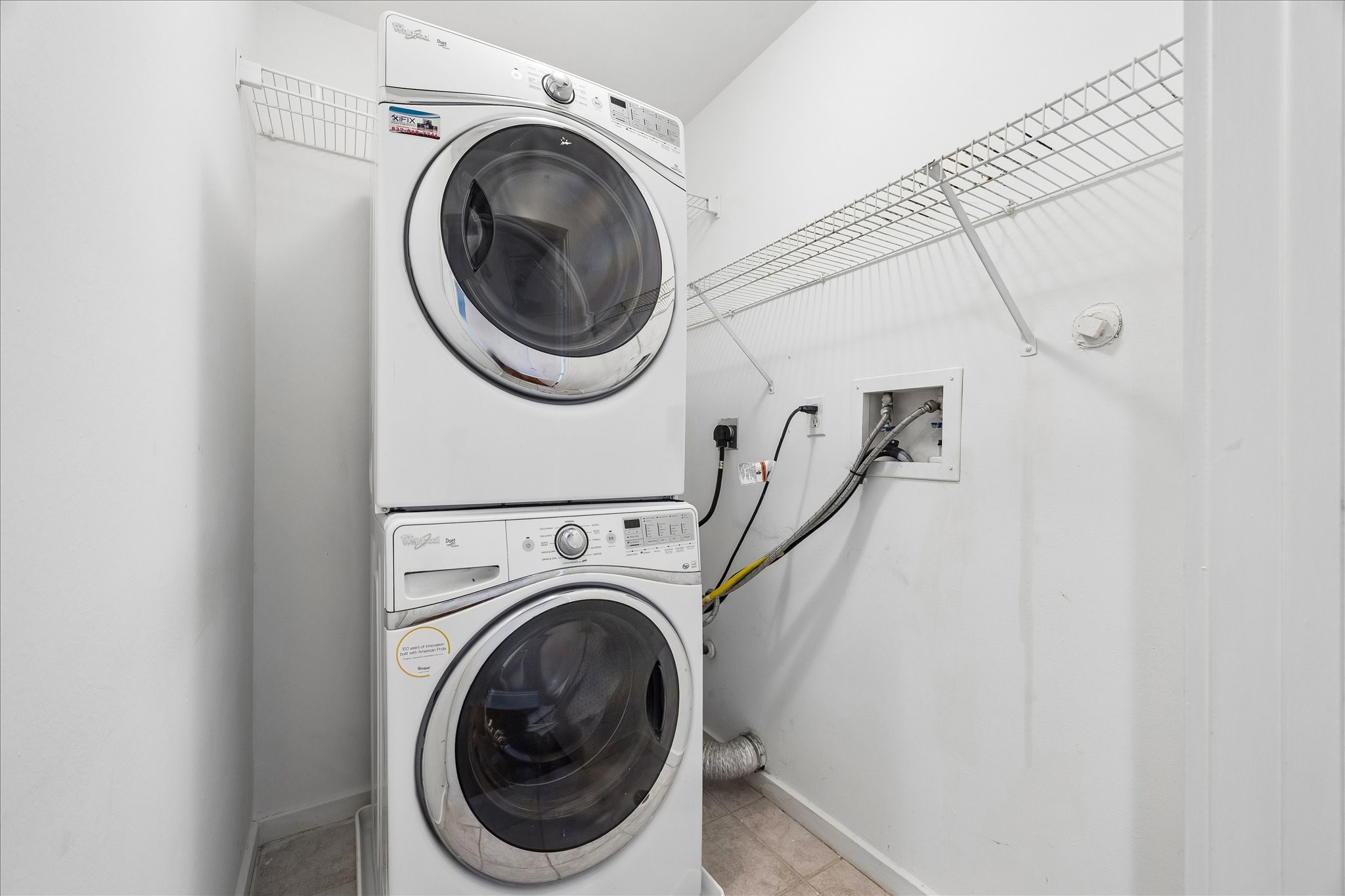 939 Colorado Street, Unit 22 Houston, TX 77007 - Photo 19 of 23 a utility room with dryer and washer