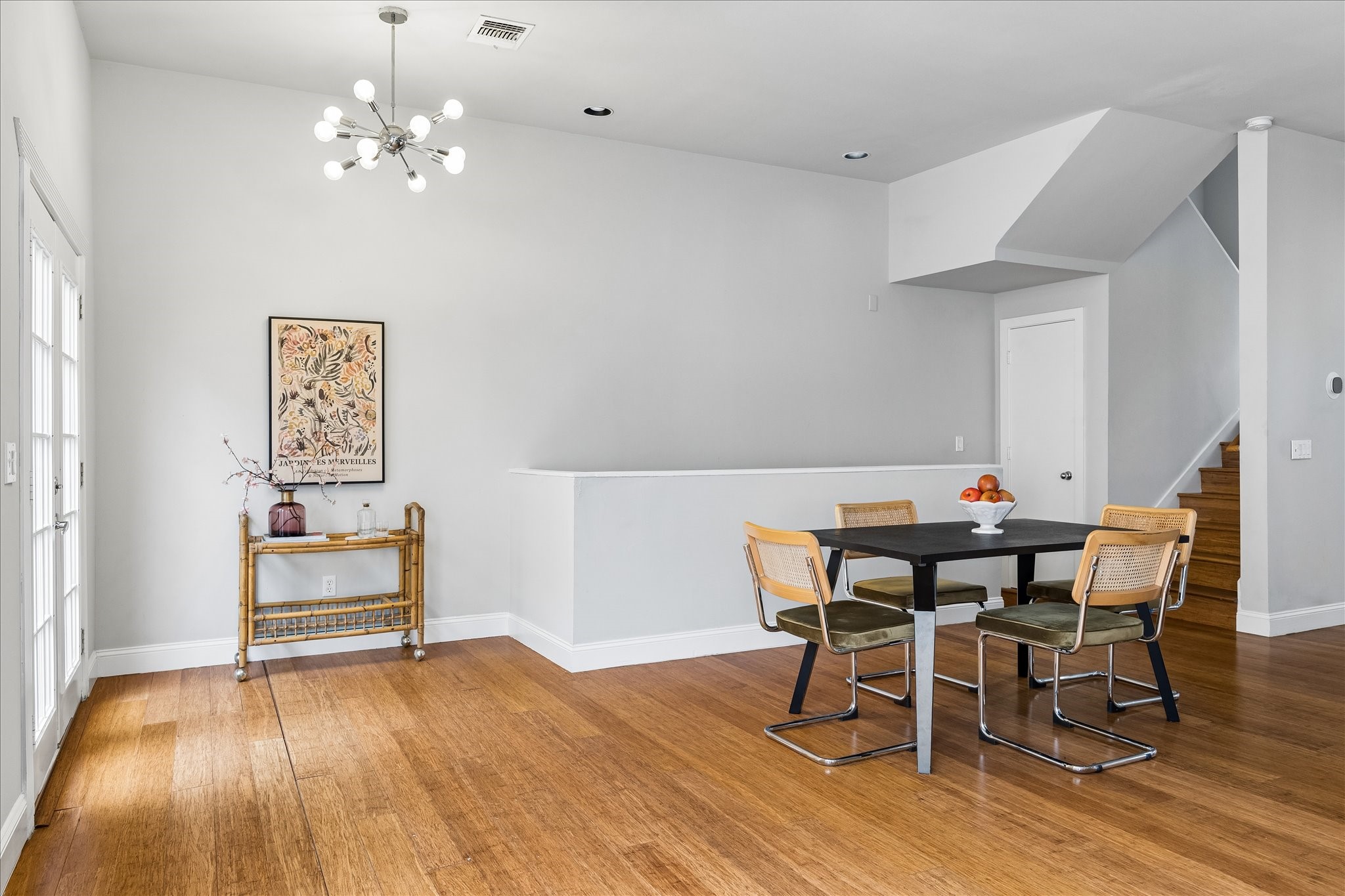 939 Colorado Street, Unit 22 Houston, TX 77007 - Photo 22 of 23 a view of a dining room with furniture and wooden floor