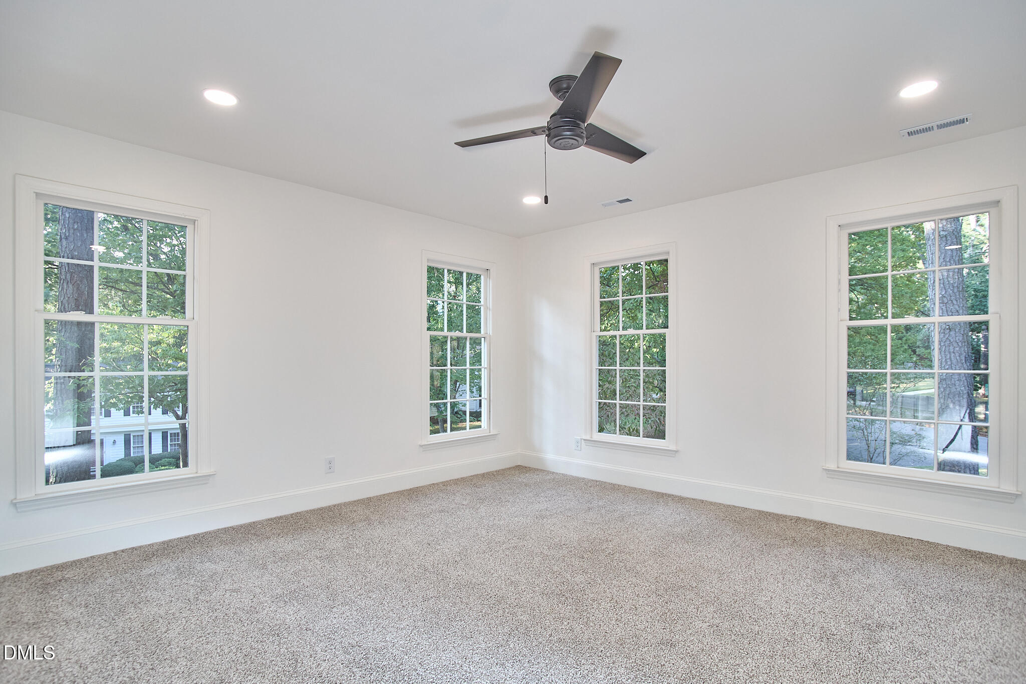5721 Timber Ridge Drive Raleigh, NC 27609 - Photo 15 of 76 a view of an empty room with a window