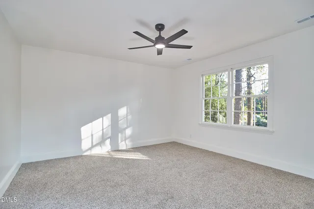 a kitchen with stainless steel appliances granite countertop a sink stove and microwave