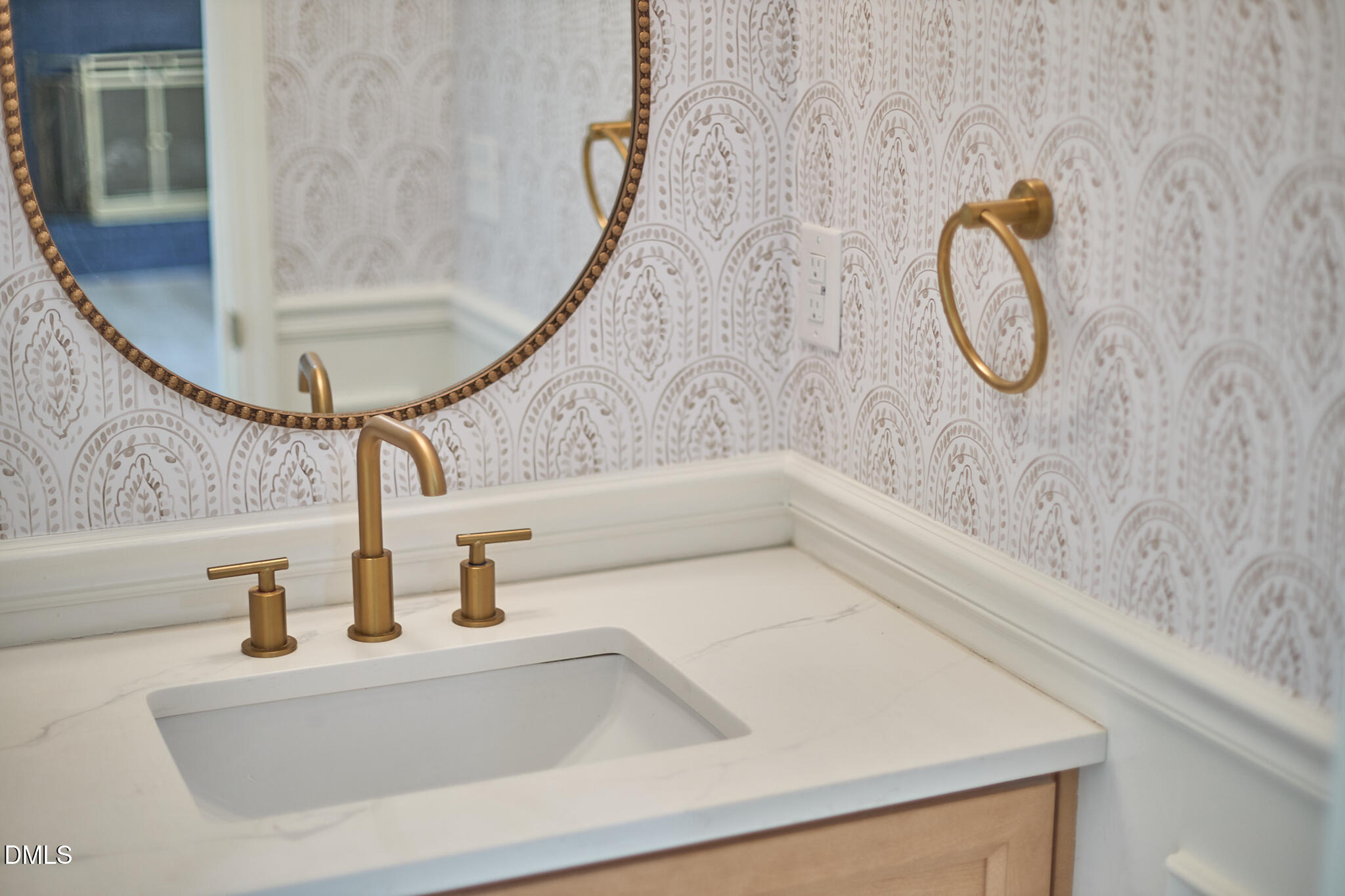 5721 Timber Ridge Drive Raleigh, NC 27609 - Photo 26 of 76 a bathroom with a sink and a mirror