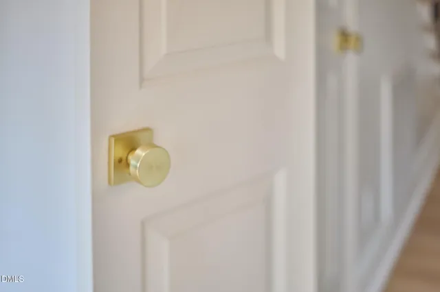 a view of balcony with wooden floor and fence