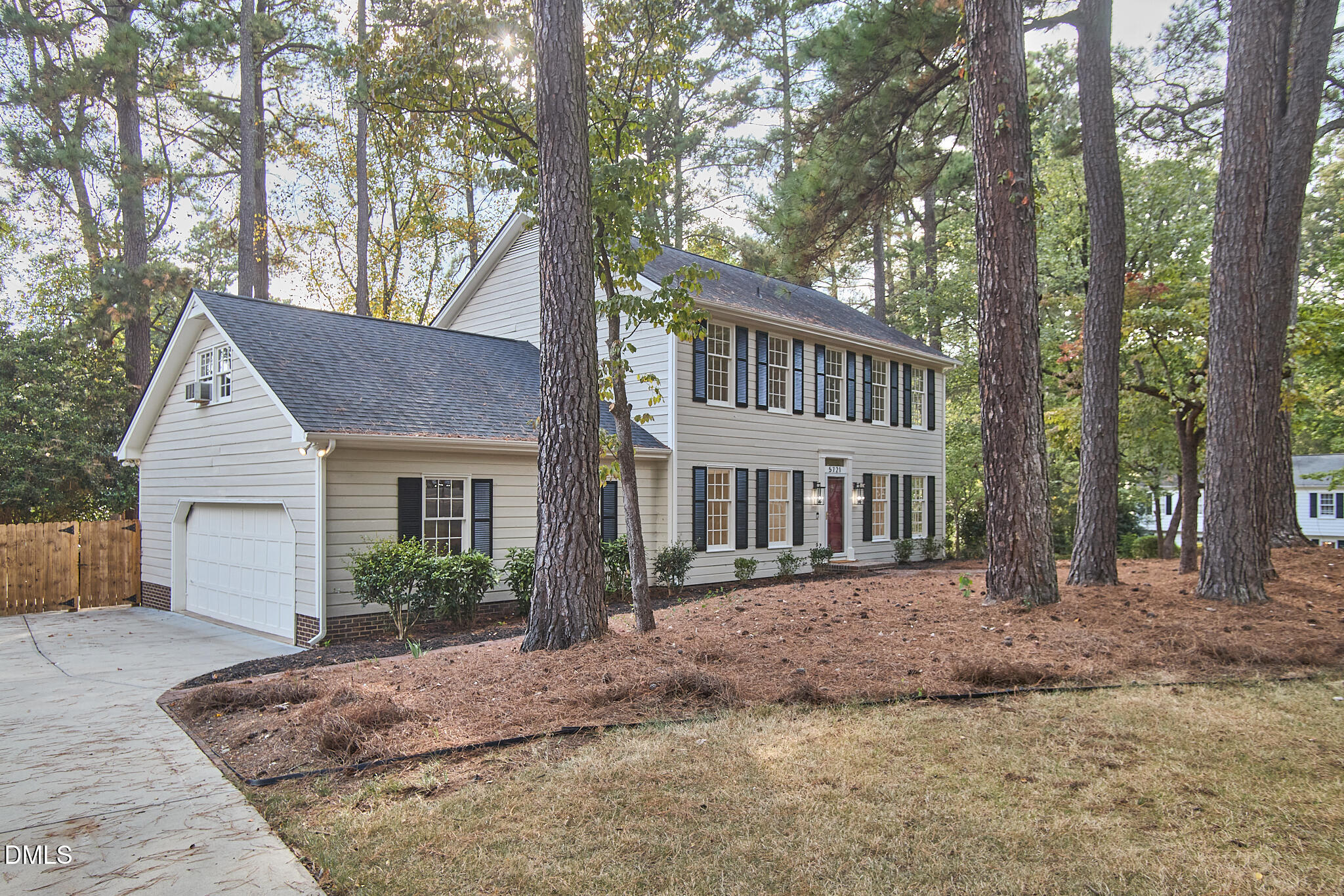 5721 Timber Ridge Drive Raleigh, NC 27609 - Photo 36 of 76 a view of a house with a yard