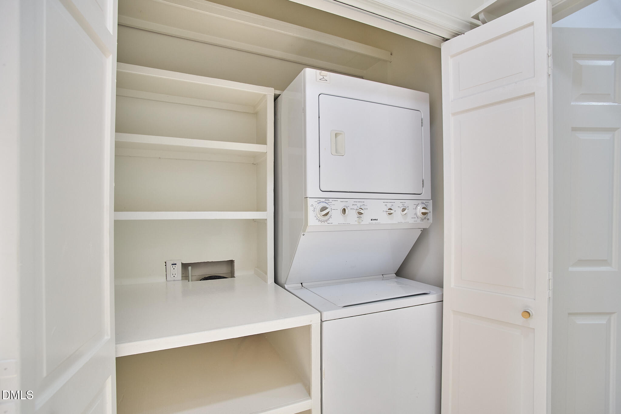 5721 Timber Ridge Drive Raleigh, NC 27609 - Photo 51 of 76 a utility room with dryer and washer