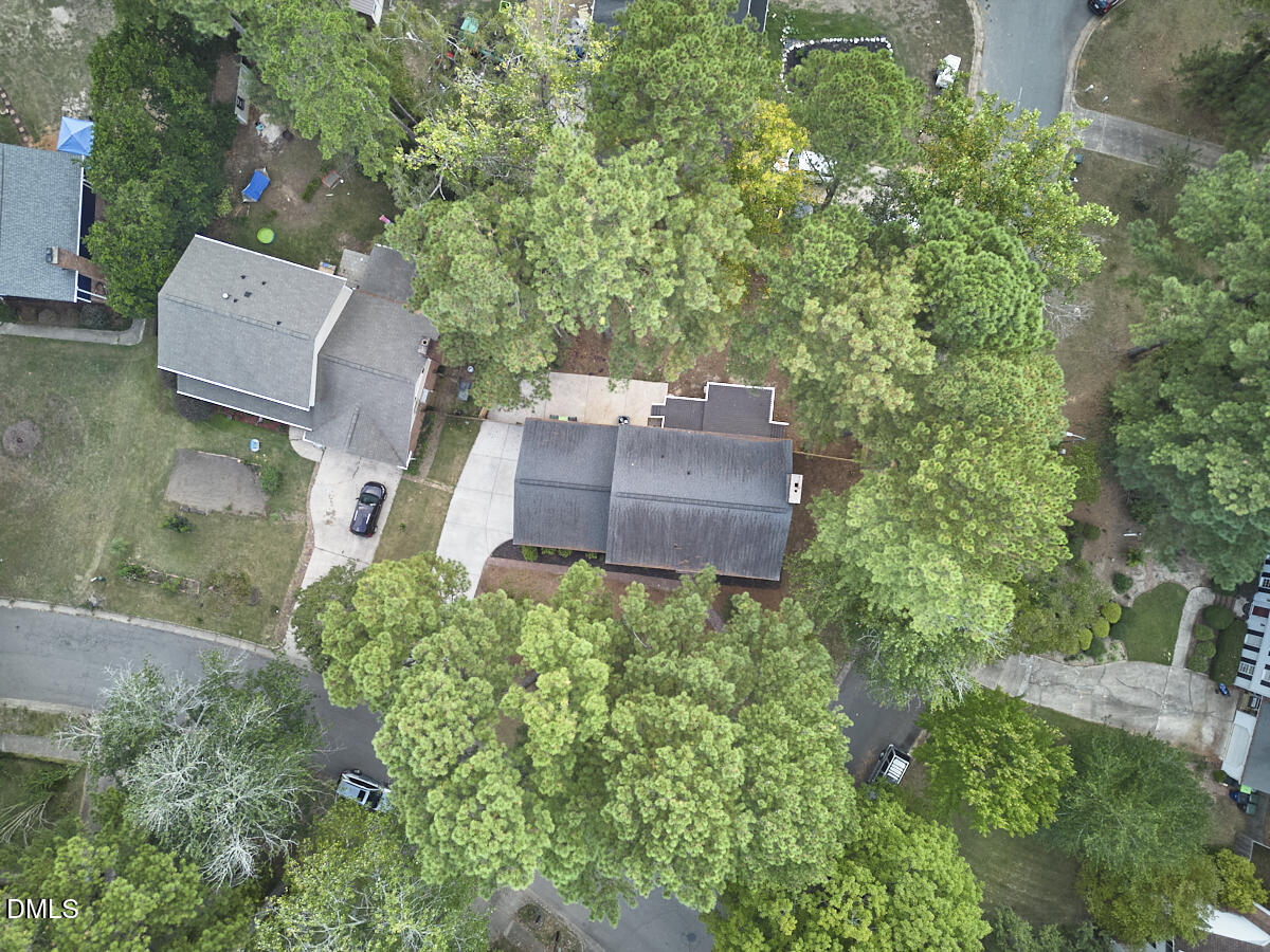 5721 Timber Ridge Drive Raleigh, NC 27609 - Photo 68 of 76 an aerial view of a house with a yard
