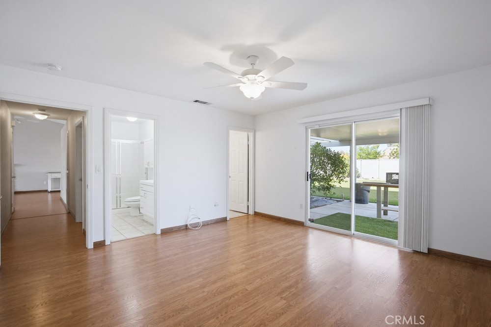 2998 Elder Way Hemet, CA 92545 - Photo 12 of 28 wooden floor in an empty room with a window