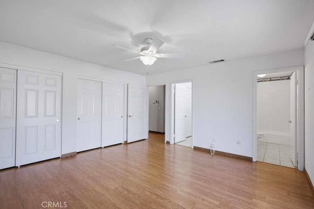 2998 Elder Way Hemet, CA 92545 - Photo 13 of 28 a view of an empty room with wooden floor