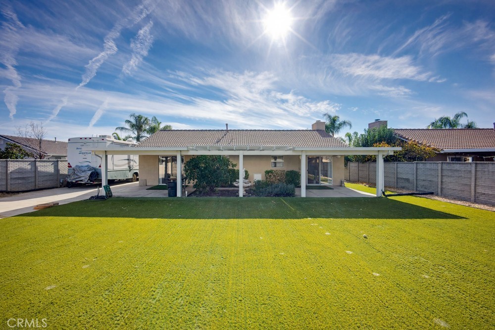 2998 Elder Way Hemet, CA 92545 - Photo 24 of 28 a view of an house with swimming pool and yard
