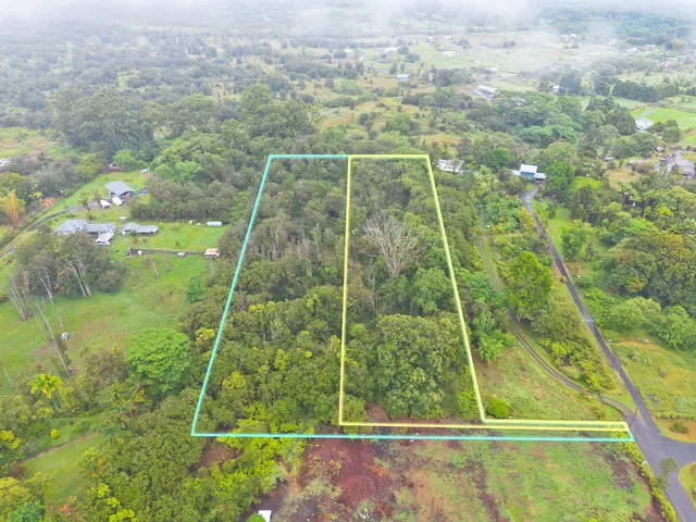 a sign that is sitting in a yard