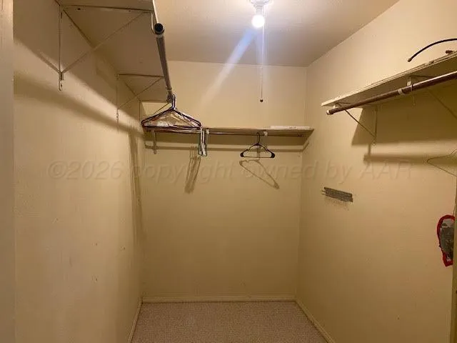 a view of a room with racks on the wall