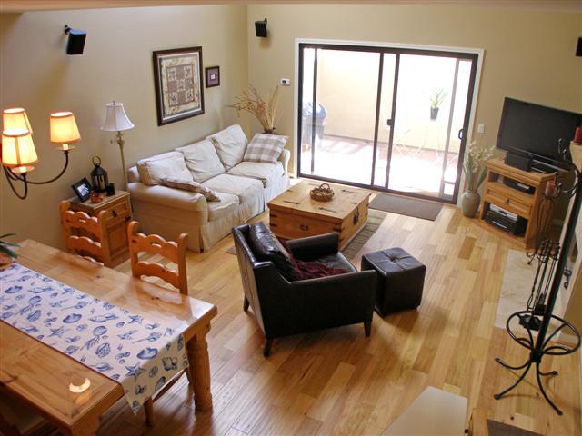 3566 Modoc Road, Unit 36 Santa Barbara, CA 93105 - Photo 7 of 18 a living room with furniture and a flat screen tv