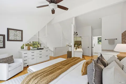 a bedroom with a bed and furniture