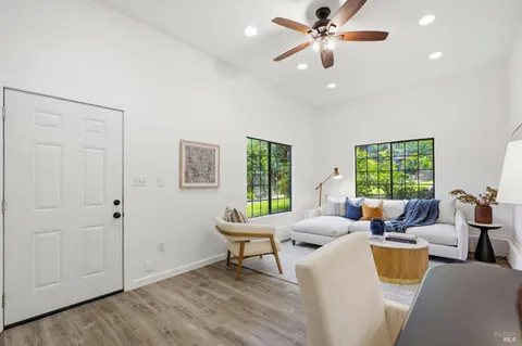 a front view of a house with a garden