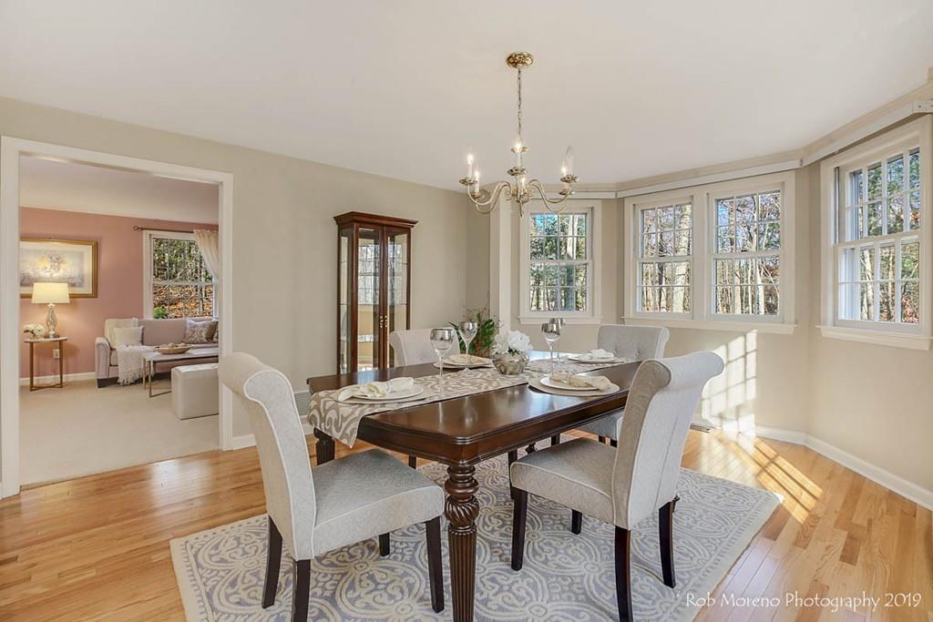 52 Pye Brook Lane Boxford, MA 01921 - Photo 5 of 41 a view of a dining room with furniture window and wooden floor