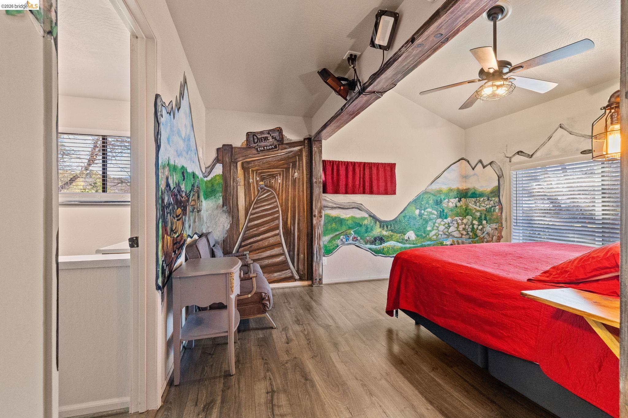 22941 Hudson Road Columbia, CA 95310 - Photo 14 of 34 a bedroom with furniture and a bed