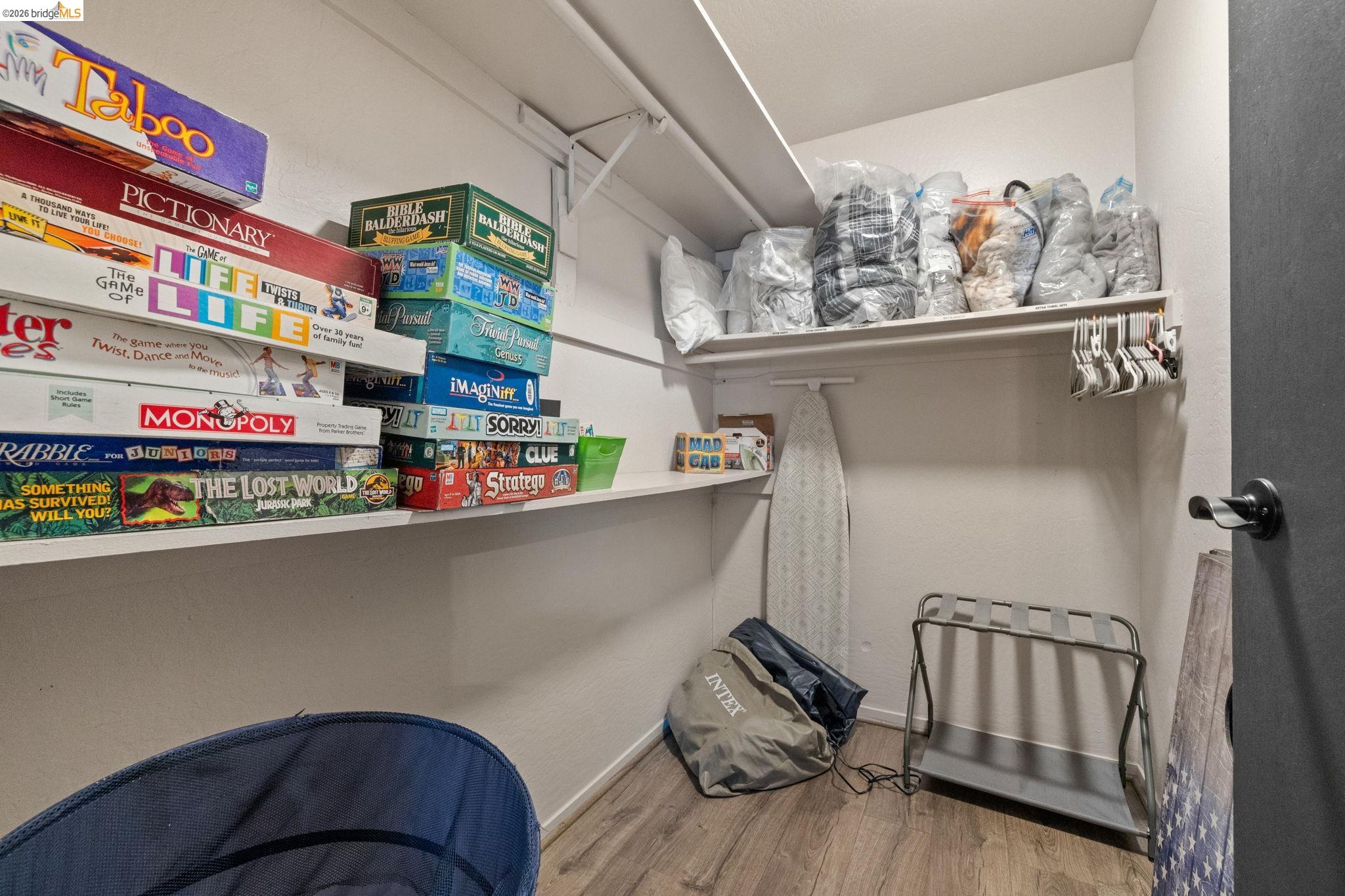 22941 Hudson Road Columbia, CA 95310 - Photo 15 of 34 a utility room with lots of clutter and cabinets