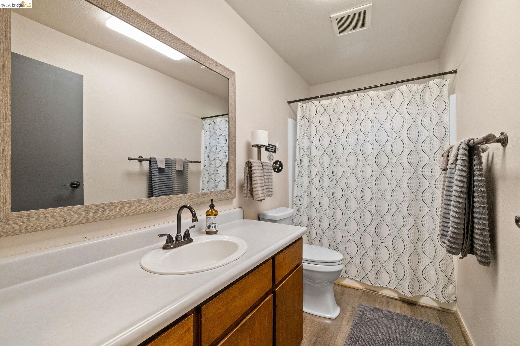 22941 Hudson Road Columbia, CA 95310 - Photo 19 of 34 a bathroom with a sink toilet and shower