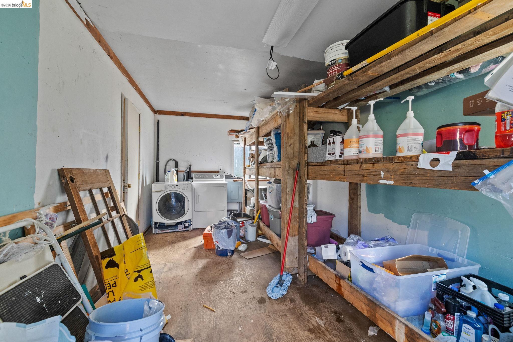 22941 Hudson Road Columbia, CA 95310 - Photo 21 of 34 a storage room with furniture and a small window