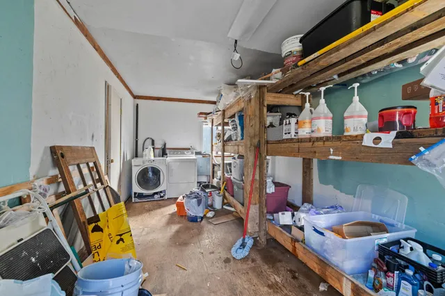 a storage room with furniture and a small window