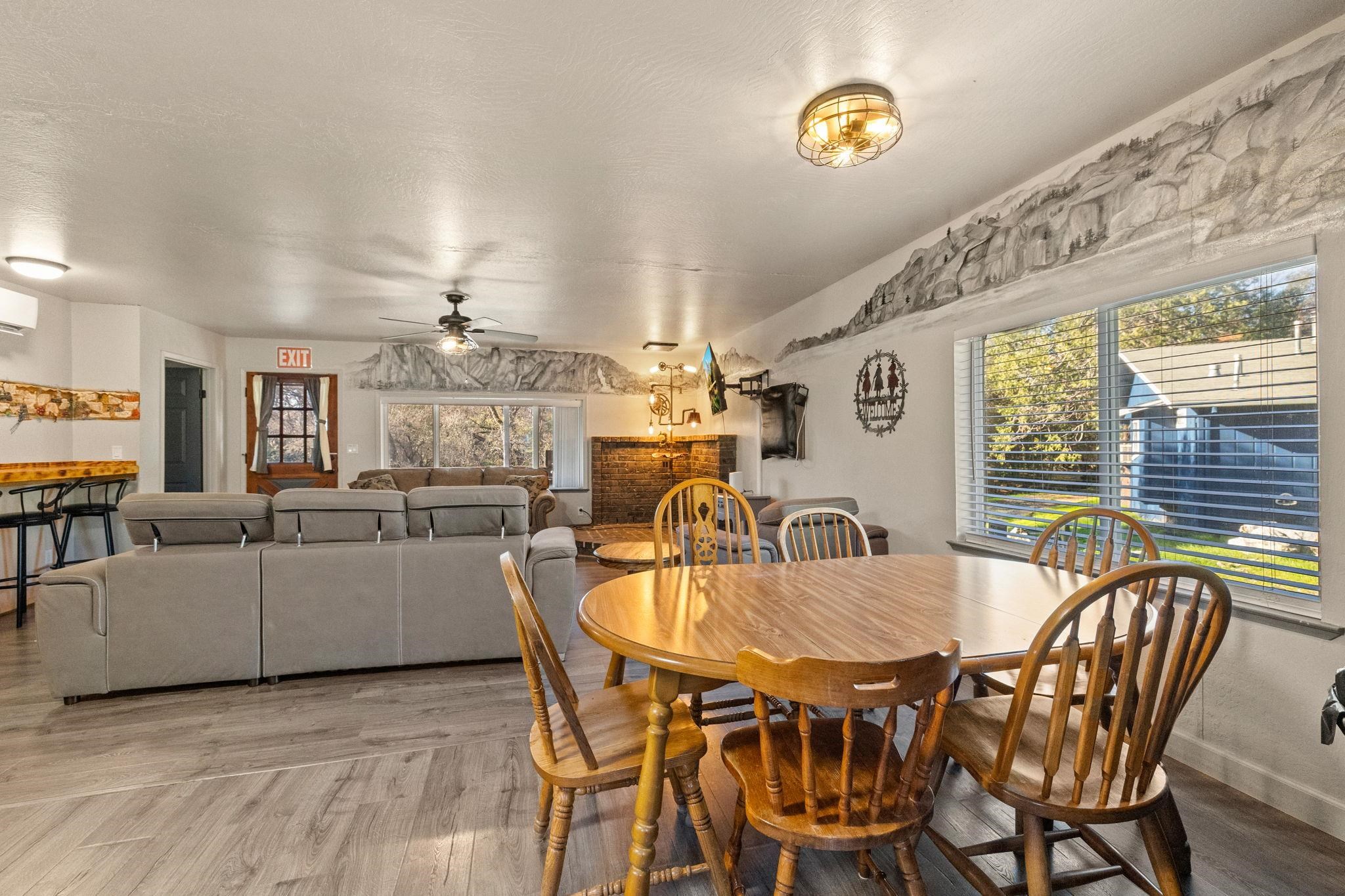 22941 Hudson Road Columbia, CA 95310 - Photo 6 of 34 Dining space with ceiling fan and wood finished floors