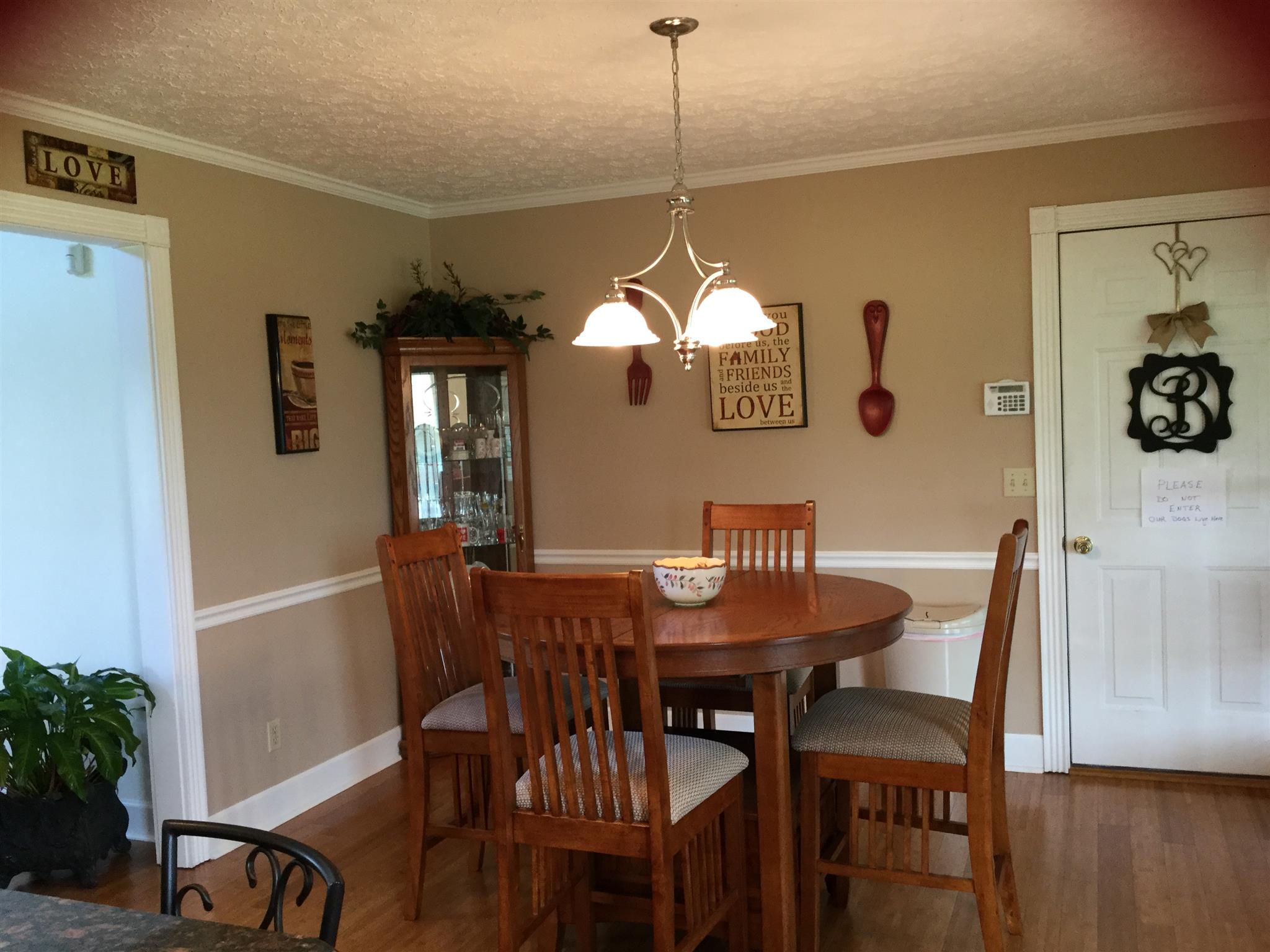 1901 Abiff Road Burns, TN 37029 - Photo 14 of 20 a view of a dining room with furniture and wooden floor