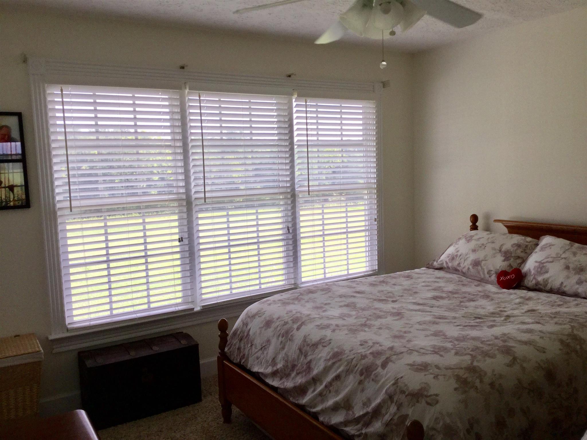 1901 Abiff Road Burns, TN 37029 - Photo 15 of 20 a bedroom with a large bed and a window