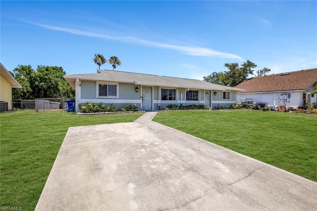 7481-7485 Pebble Beach Road Fort Myers, FL 33967 - Photo 17 of 31 a view of house with a yard