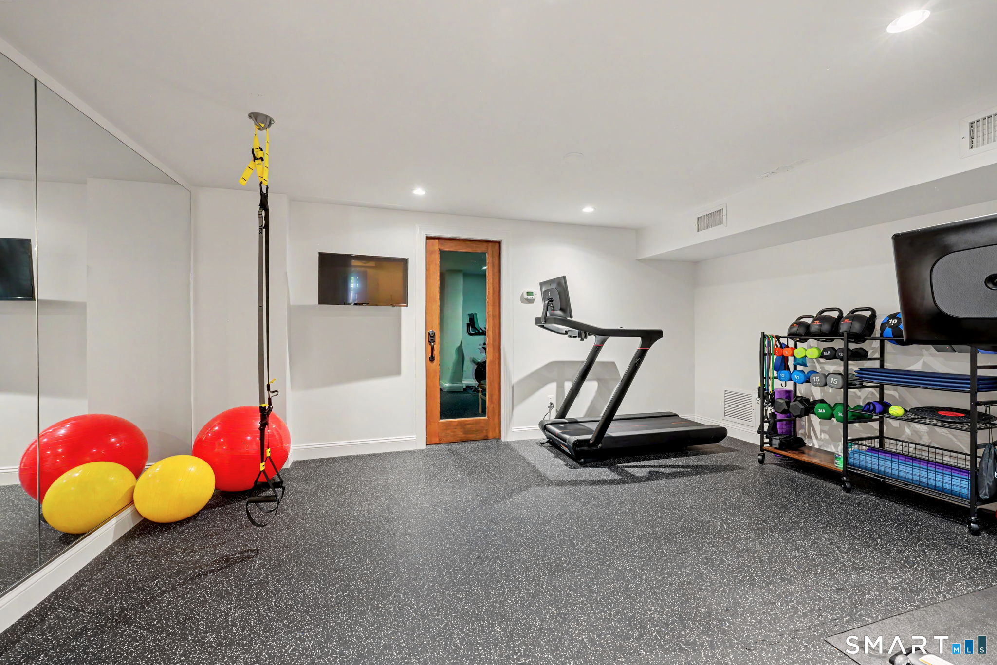 10 Side Hill Road Westport, CT 06880 - Photo 36 of 40 a view of a room with gym equipment