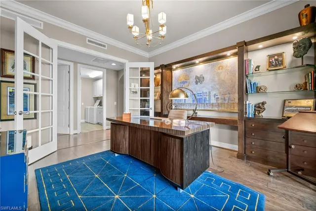 a large kitchen with stainless steel appliances granite countertop a stove and cabinets