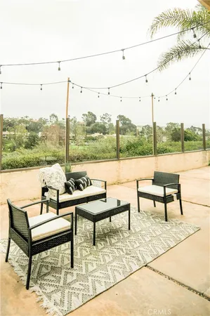 a view of a terrace with outdoor seating