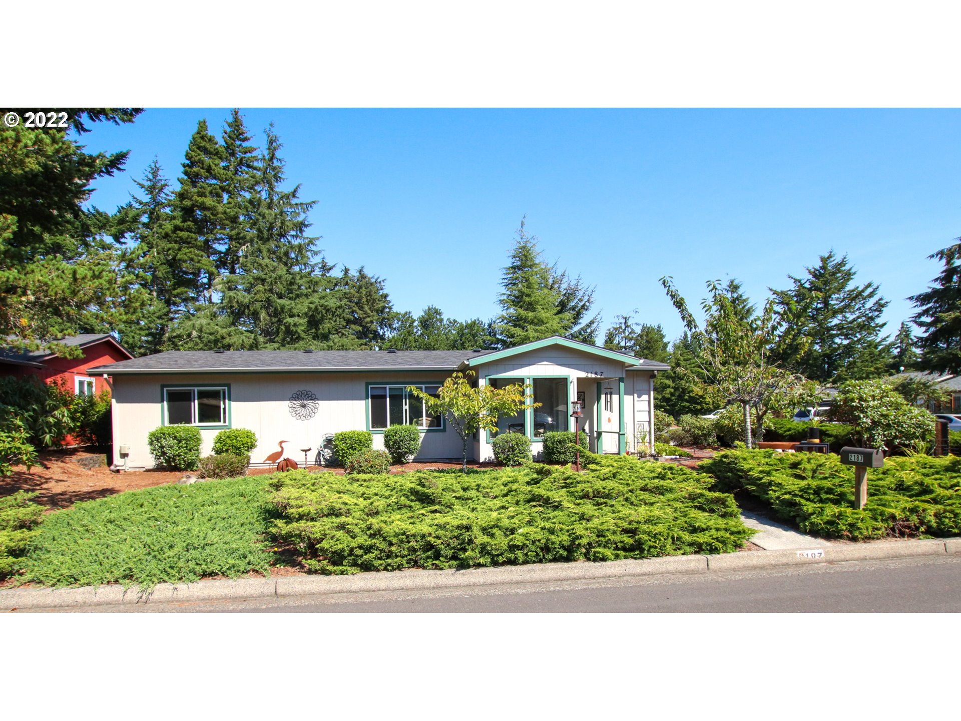 a house view with a garden space