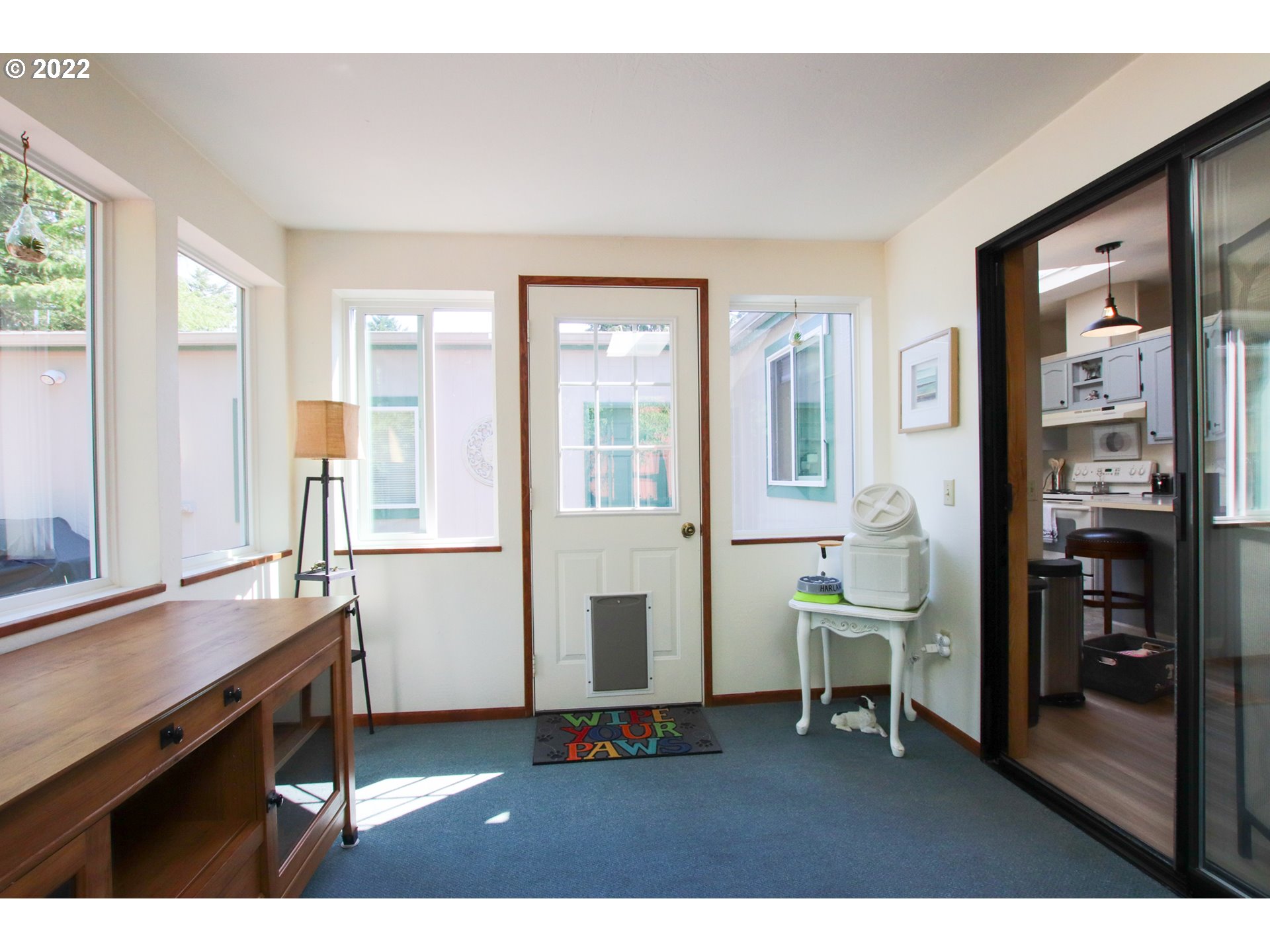 2187 12th Street Florence, OR 97439 - Photo 17 of 30 a living room filled with furniture and large window